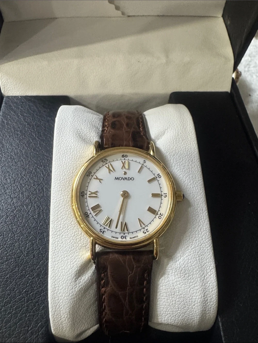 #120 Movado Gold Tone Case White Dial Watch with Brown Leather Strap